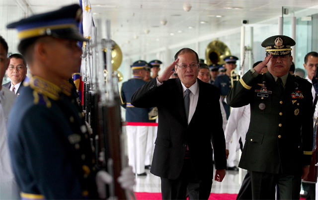 OFF TO KOREA. President Benigno S. Aquino III, accompanied by AFP Vice Chief of Staff Lt. Gen. Alan Luga, at the NAIA Terminal 2 October 17, 2013, before he embarked on a two day State Visit to the Republic of Korea. Rey Baniquet / Malacañang Photo Bureau