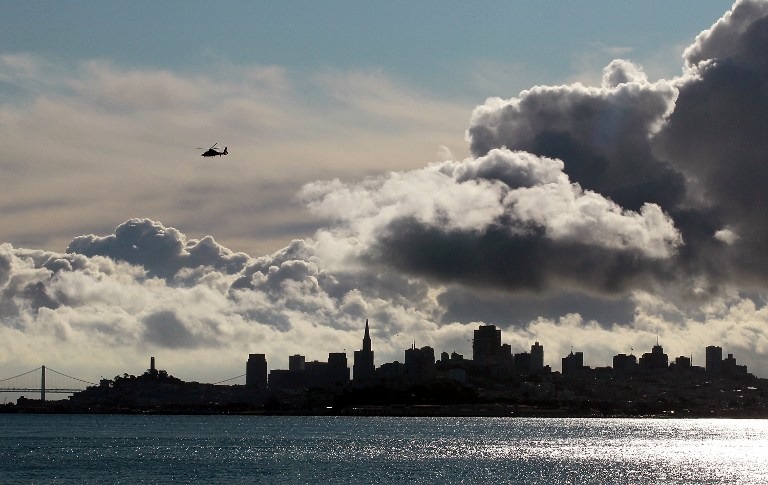 Clouds pass over the San Francisco skyline on November 4, 2011 in Sausalito, California. Justin Sullivan/Getty Images/AFP