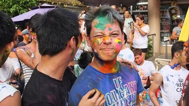 PAINT-SMEARED and loving it. Festival-goers did not shy away from sweat, paint and festive mayhem