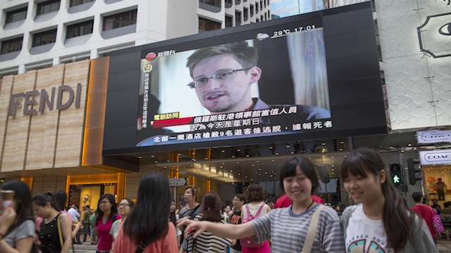 SNOWDEN AWARDED. Archive footage of Edward Snowden shown on a giant screen in Hong Kong, China, June 23, 2013. Photo by EPA/Jerome Favre