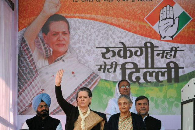 SONIA GANDHI. Chairperson of India's Congress-led UPA government Sonia Gandhi (2nd L) and Delhi Chief Minister Sheila Dikshit (2nd R) at an election rally in New Delhi on November 24, 2013. Photo by Sajjad Hussain/AFP