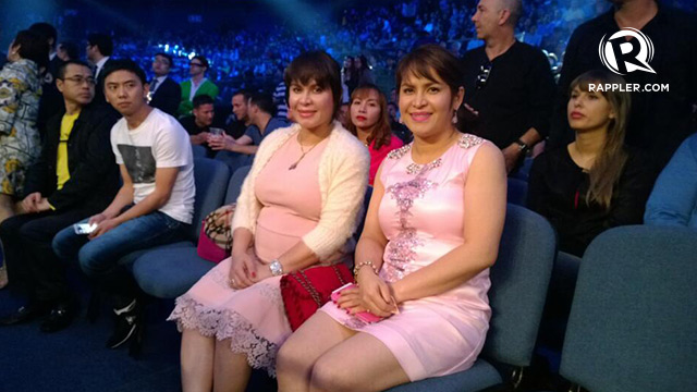 Sitting ringside is Manny's wife Jinkee and her twin sister Janet. Who's who?