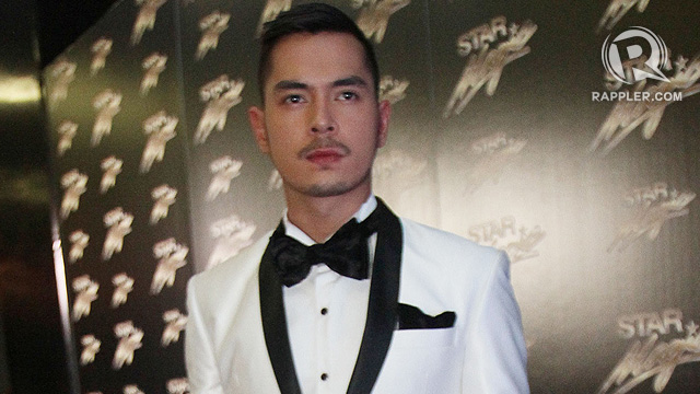 DASHING, DAPPER. Jake Cuenca arrived solo, to the joy of female fans. All photos by Inoue Jaena