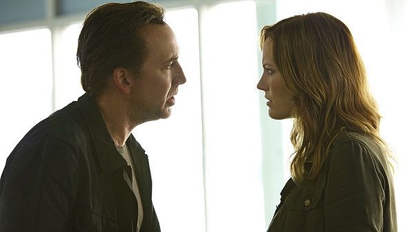 PRETTY PERSUASION. Nicolas Cage tries to convince Malin Ackerman that being in Stolen is a good idea. All images from the movie's Facebook page