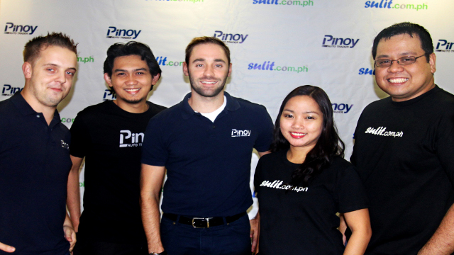 DONE DEAL. Executives of buy-and-sell website Sulit.com.ph pose after completing the acquisition of online automotive hub Pinoy Auto Trader. Photo courtesy of Sulit.com.ph