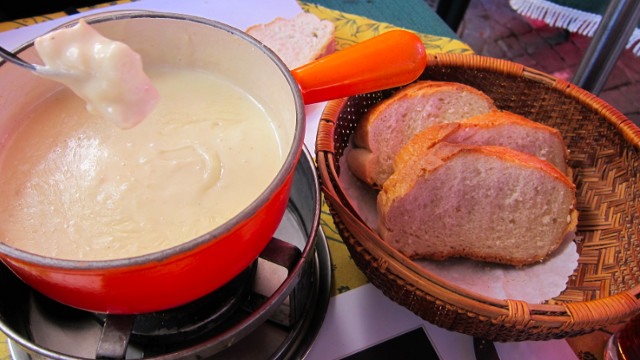 CHEESE WIZ. Cheese fondue is a different way to enjoy cheese in Switzerland