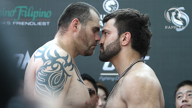 HEAVYWEIGHT SHOWDOWN. Things were heated at the weigh-in between Tim Sylvia and Andrei Arlovski, heat that is sure to intensify in the cage. Joshua Albelda.
