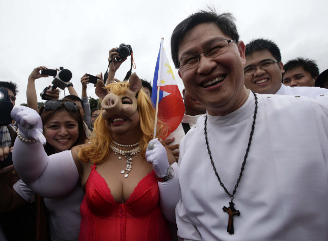 CONDEMNING GREED. Manila Archbishop Luis Antonio Cardinal Tagle, who spoke at the anti-pork barrel protest last August 26, wants the poor to partake of the world's goods. File photo by EPA/Dennis Sabangan