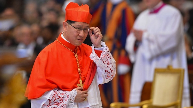 POTENTIAL SUCCESSOR. Manila Archbishop Luis Antonio Cardinal Tagle joins 116 other prelates who will elect – among themselves – the next pope. Teary eyed, Tagle became a cardinal in November 2012. File photo from AFP