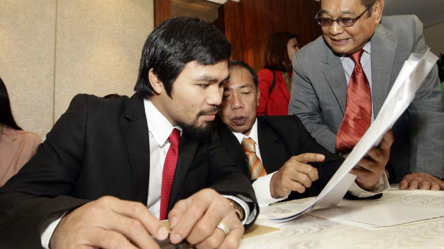 NO EXEMPTION. Malacañang says it does not support the bill seeking lifetime tax exemption for boxer Manny Pacquiao. File photo from EPA/Dennis Sabangan
