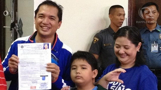 WET LOOK. Bayan Muna Rep Teddy Casiño files his certificate of candidacy accompanied by his family at the Comelec office in Manila. Photo by Paterno Esmaquel II 