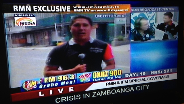 SAVING HIS CONSTITUENTS: Barangay councilor Teodyver Arquiza. Screenshot of television screen