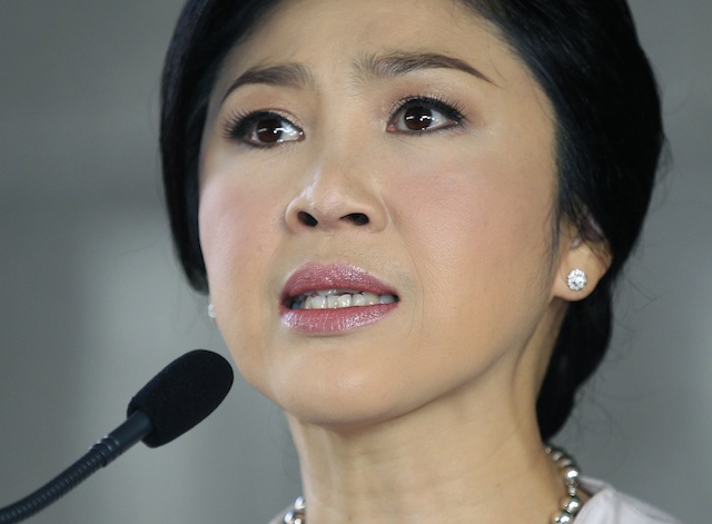 DEFIANT. Caretaker Thai Prime Minister Yingluck Shinawatra speaks to media during a press conference at the Thai Army Club in Bangkok, Thailand, 10 December 2013. EPA/Narong Sangnak