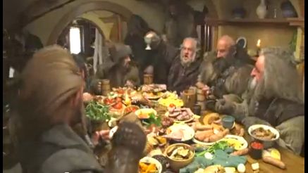 FOOD FIGHT. Where there are dwarves and food, there will be a food fight. Screen grab from YouTube (Tolkiendrim)