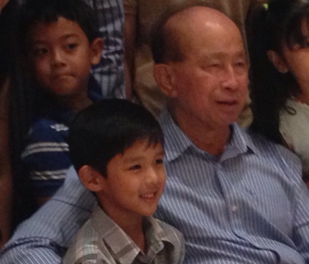 MY FATHER AND SON. Tiago is shown with his grandfather Juanito Remulla during the elder Remulla's 80th birthday on April 14, 2013. Photo from Jonvic Remulla