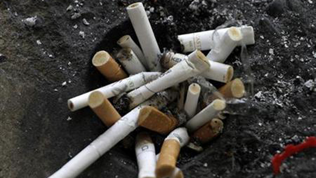 Cigarette butts in an ashtray in Los Angeles, California, May 31, 2012. Credit: Reuters/Jonathan Alcorn