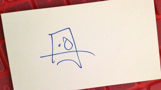 MY VERY OWN TYLER Ramsey artwork: the face he drew at the back of my business card.
