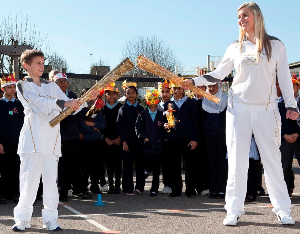PASSING THE FLAME. A look at the uniform of the Olympic torchbearers. Photo from the London 2012 website
