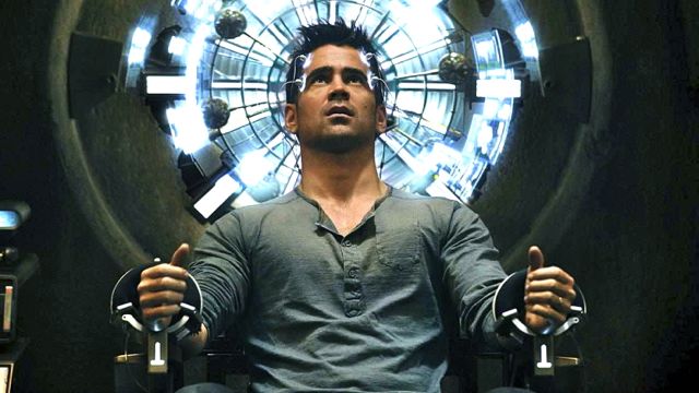 STRAPPED ON. Colin Farrell shows exactly how Total Recall viewers look while watching.