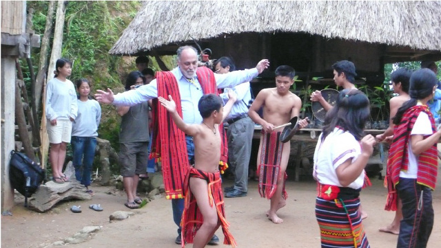 PHILIPPINE TOURISM. A foreigner joins an Igorot community dance. Photo taken from the National Tourism Development Plan.