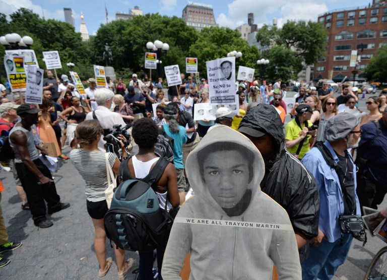 PROTESTS FOR TRAYVON. A man holds a cardboard cutout of Trayvon Martin during a demonstration in New York on July 14, 2013. Photo by AFP/Stan Honda