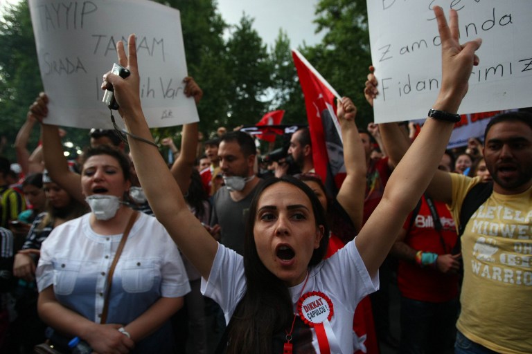 DEFIANCE. Anti-government protesters attend a demonstration in central Ankara, Turkey, June 8. File photo by Adem Altan/AFP