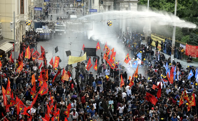 DEMONSTRATIONS. Turkish riot police use water cannons to disperse protestors as they clash at a demonstration for the victims of the Soma mine explosion, in Istanbul, May 14, 2014. Erdem Sahin/EPA