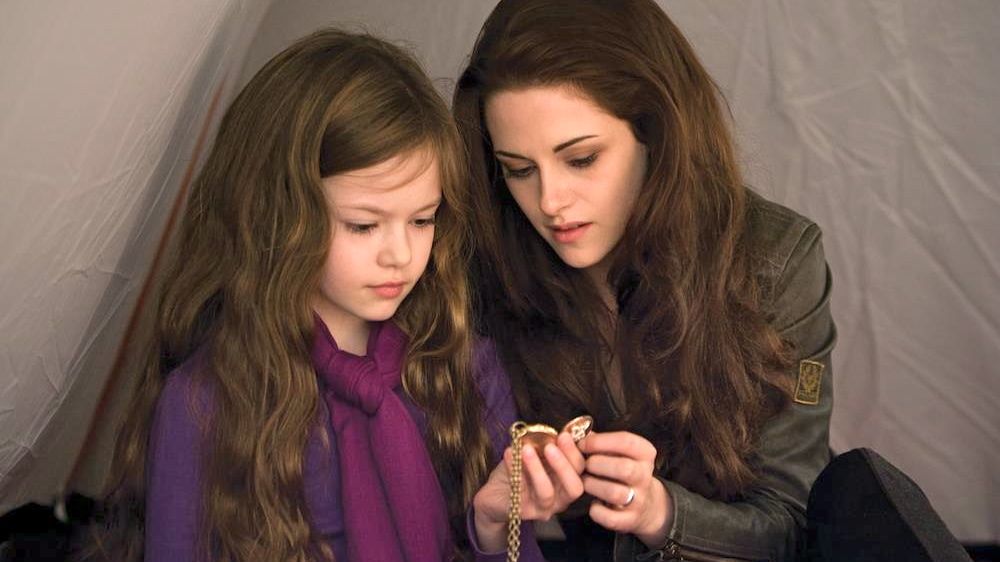 BORN, NOT BITTEN. Renesmee (Mackenzie Foy) with mom Bella (Kristen Stewart) in a scene from 'Breaking Dawn' part 2. Image from the movie's Facebook page