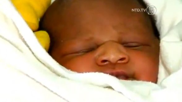 BABY BARACK OBAMA. Screen grab from YouTube (NTDTV)