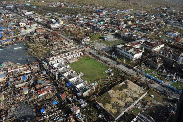 FLATTENED. Reports say that 100% of the structures in Guiuan, Eastern Samar, are damaged. Photo by AFP/Ted Aljibe