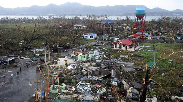 DEVASTATION IN TACLOBAN. A general shot shows houses destroyed by the strong winds caused by typhoon Yolanda (Haiyan) at Tacloban, eastern island of Leyte on November 9, 2013. AFP/Noel Celis