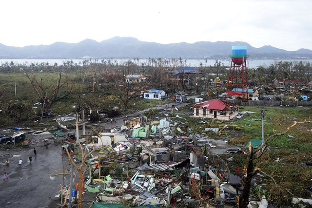 DEVASTATION IN TACLOBAN. A general shot shows houses destroyed by the strong winds caused by typhoon Yolanda (Haiyan) at Tacloban, eastern island of Leyte on November 9, 2013. AFP/Noel Celis