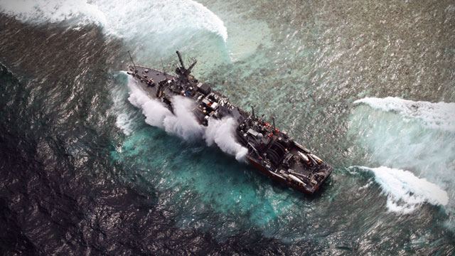 STILL STUCK. Philippine Air Force aerial image of the USS Guardian near the upper side of Tubbataha's South Atoll. Photo courtesy of AFP Wescom