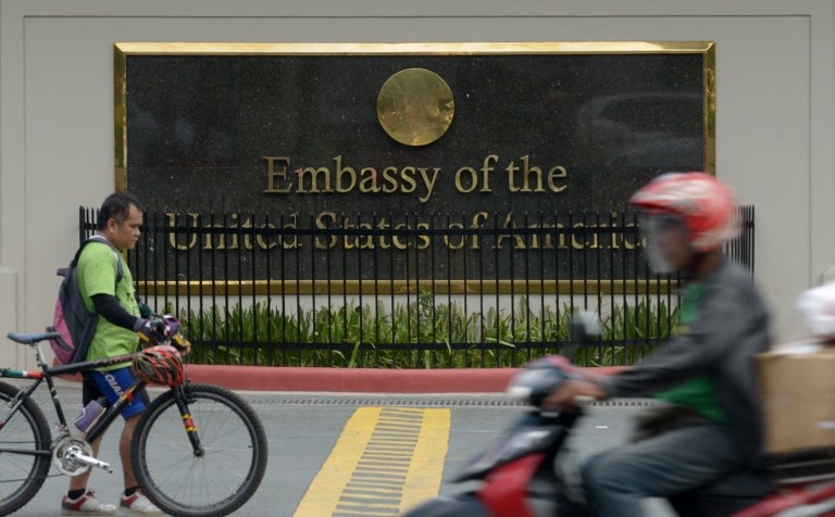 SPY POST? A map leaked by fugitive intelligence officer Edward Snowden showed the US Embassy in Manila as one of 90 "listening posts" used to monitor communications in the region. In this photo, commuters pass in front of the highly-secured US embassy in Manila on July 6, 2013. AFP / Jay Directo