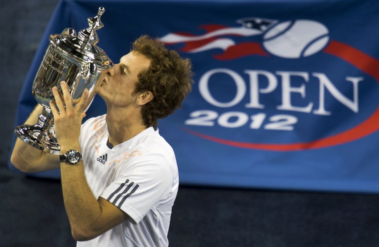 VICTORY. In this file photo, aAndy Murray of Great Britain kisses the US Open trophy after his win over Novak Djokovic of Serbia at the 2012 US Open tennis tournament September 10, 2012 in New York. AFP/Don Emmert
