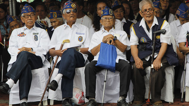 HEROES TOO. Bulacan veterans are seated in front during the rites at Barasoain Church. Photo by AC Dimatatac