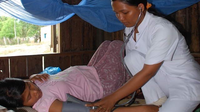 MATERNAL CARE. In Vietnam, midwives provide prenatal care in households. All photos by UNFPA