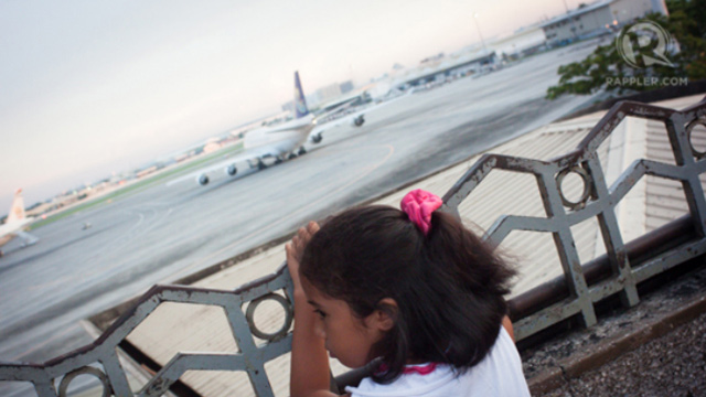 AIRPORT. A young Filipino girl awaits the arrival of someone dear. All photos by Harold Alambra