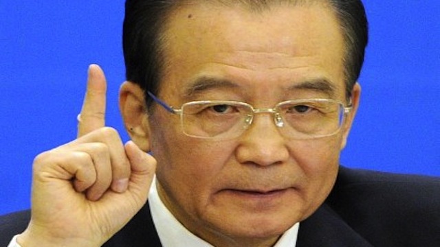 Chinese Premier Wen Jiabao answers a question from the media during a press conference at the National People's Congress' annual session at the Great Hall of the People in Beijing. Photo courtesy of AFP