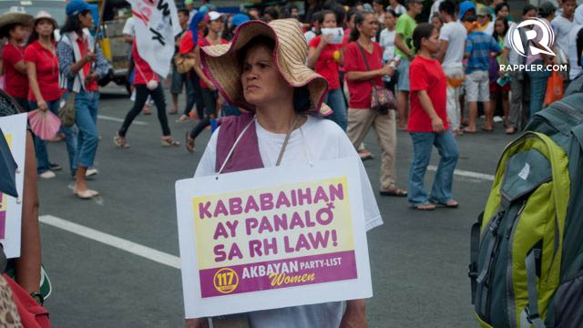 RH LAW. Women's groups hail the passage of the reproductive health law, which they say empowers women to take control of their sexual health.
