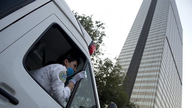 PEMEX BLAST. Explosion rocks the Mexico City skyscraper that houses oil giant Pemex. Photo from AFP