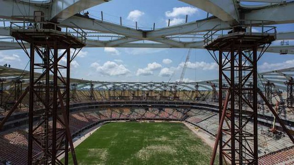 STADIUM IN THE AMAZON. Picture taken on November 25, 2013 of the Arena Amazonia stadium under construction in Manaus, Amazonas state, Brazil. AFP / Yasuyoshi Chiba