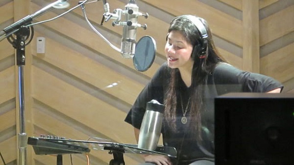 SONGBIRD. Regine Velasquez sings the people's song. Photos courtesy of Jane Villa