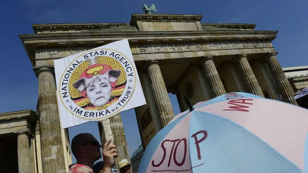 PROTEST. Germany on October 24, 2013 summoned the US ambassador to Berlin over suspicions that Washington spied on Chancellor Angela Merkel's mobile phone. File photo by AFP / JOHN MACDOUGALL