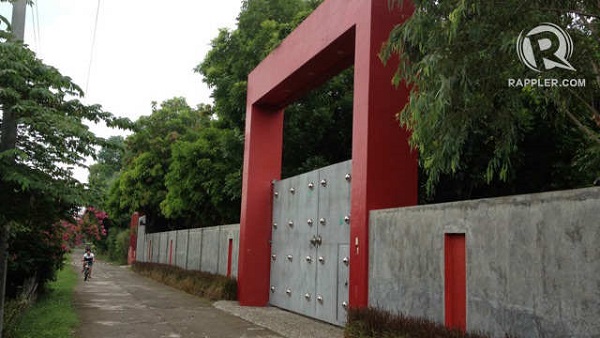 FORTRESS. The gate of one of Gigi Reyes' properties in Matuod, Lian, Batangas. Photo by Rappler