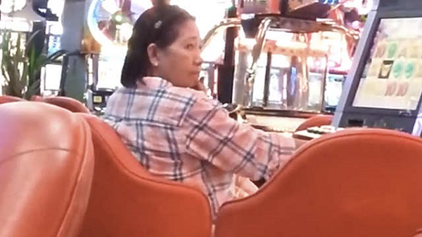 GRACEFUL EXIT? Land Transport Office chief Virginia Torres retires as government investigates her casino 'presence.' Photo is a screenshot of YouTube video that went viral in August