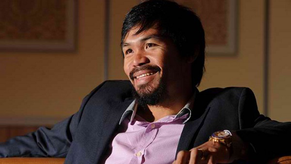 BOXING & POLITICS. Manny Pacquiao speaks during an AFP interview in Macau on July 27, 2013. Photo by AFP / Dale de la Rey