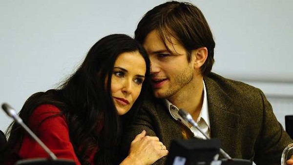 IN HAPPIER TIMES. In this file photo, US actress Demi Moore and husband actor Ashton Kutcher cuddle during the launch of a UN fund aimed at helping fight against human trafficking at the United Nations headquarters in New York, November 4, 2011. AFP/Emmanuel Dunand