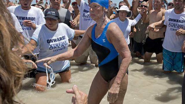 HISTORIC SWIM. Diana Nyad emerges from the Atlantic Ocean after completing a 111-mile swim from Cuba to Key West, Florida, USA, 02 September 2013. EPA/Andy Newman / Florida Keys News Bureau / Handout