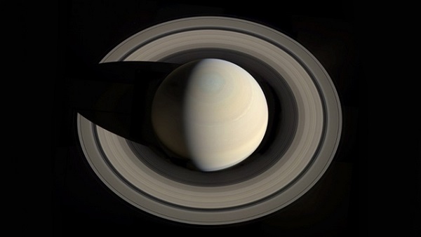 SPACE, - : This NASA portrait received October 18, 2013 shows a view looking down on Saturn and its rings, created from images obtained by NASA's Cassini spacecraft on October 10, 2013. It was made by amateur image processor and Cassini fan Gordan Ugarkovic. This image has not been geometrically corrected for shifts in the spacecraft perspective and still has some camera artifacts.The mosaic was created from 12 image footprints with red, blue and green filters from Cassini's imaging science subsystem. Ugarkovic used full color sets for 11 of the footprints and red and blue images for one footprint. AFP PHOTO/NASA =RESTRICTED TO EDITORIAL USE - MANDATORY CREDIT "AFP PHOTO /NASA/JPL-Caltech/Space Science Institute/G. Ugarkovic"